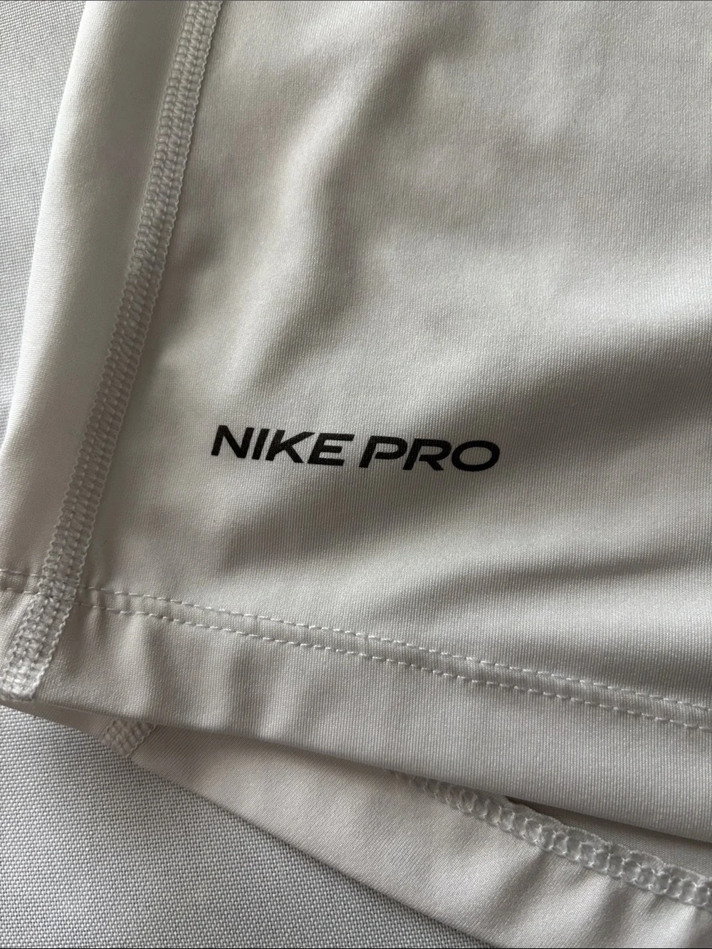 Nike White Sleeveless Training Tank with Black Logo kids size S
